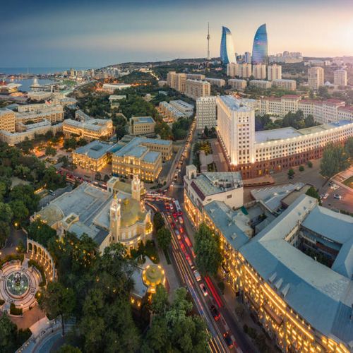 public-park-and-old-town-of-baku-city-at-illuminated-evening-hour-azerbaijan